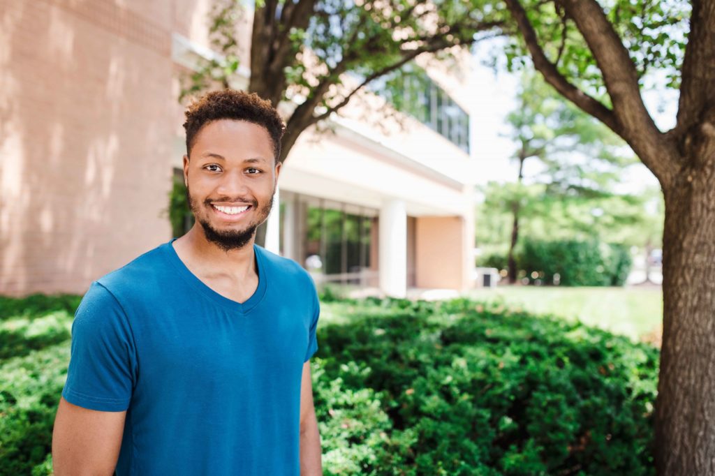 young man in his twenties smiling